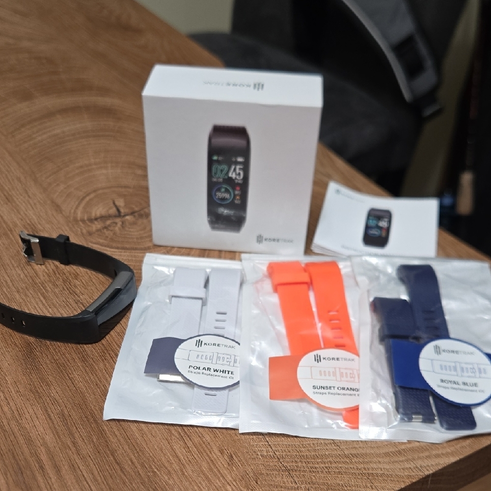 Smartwatch in Black, White, Orange, and Blue